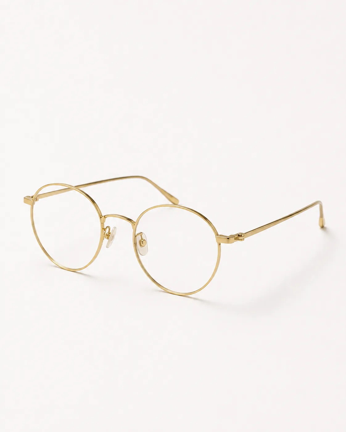 Lentes redondo dorado vistos de frente